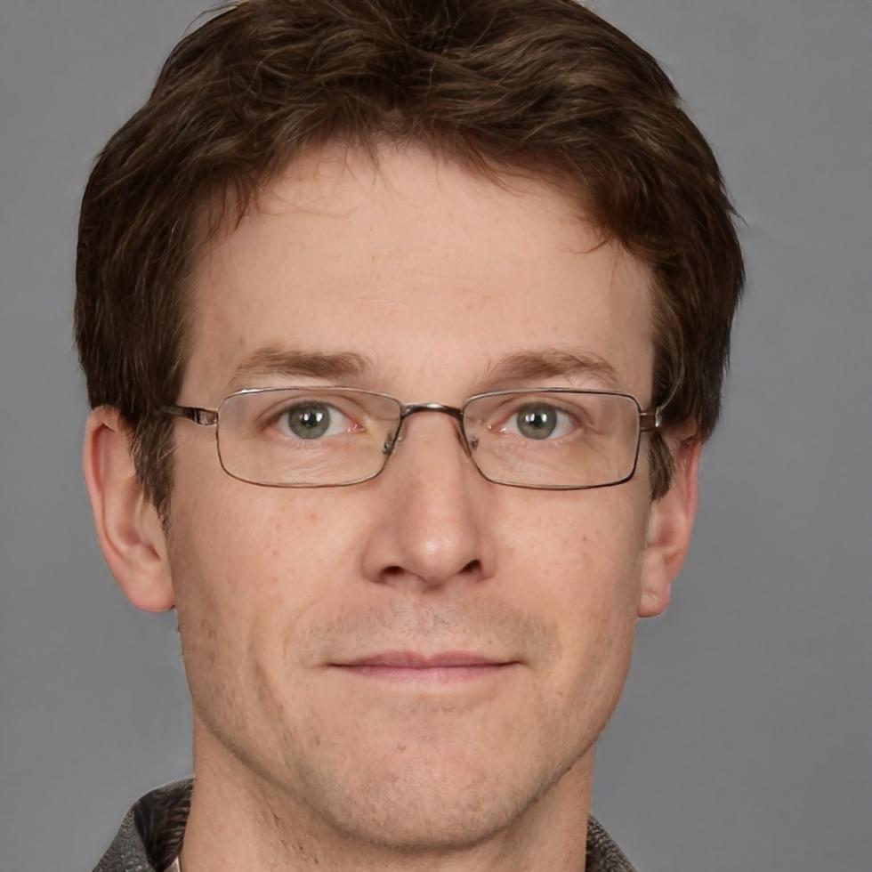 Professional business consultant reviewing financial documents in modern office setting